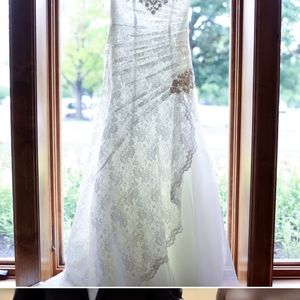 Fit and flare lace and beaded wedding Dress